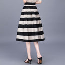 Conjunto Beleza Pura™: Saia com Listras Notáveis e Blusa Elegante!